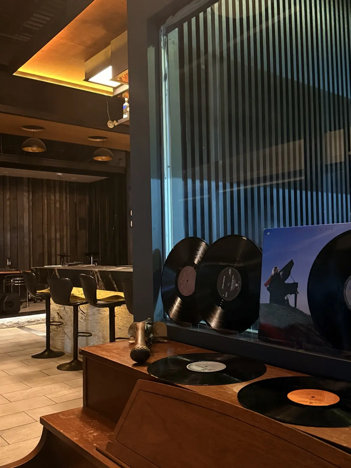 Vinyl records beside Hotferno's bar